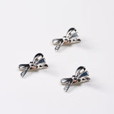 SILVER BOW HAIR CLIP