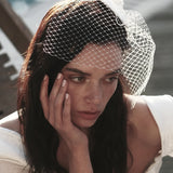 CAROLYN VOILETTE FASCINATOR